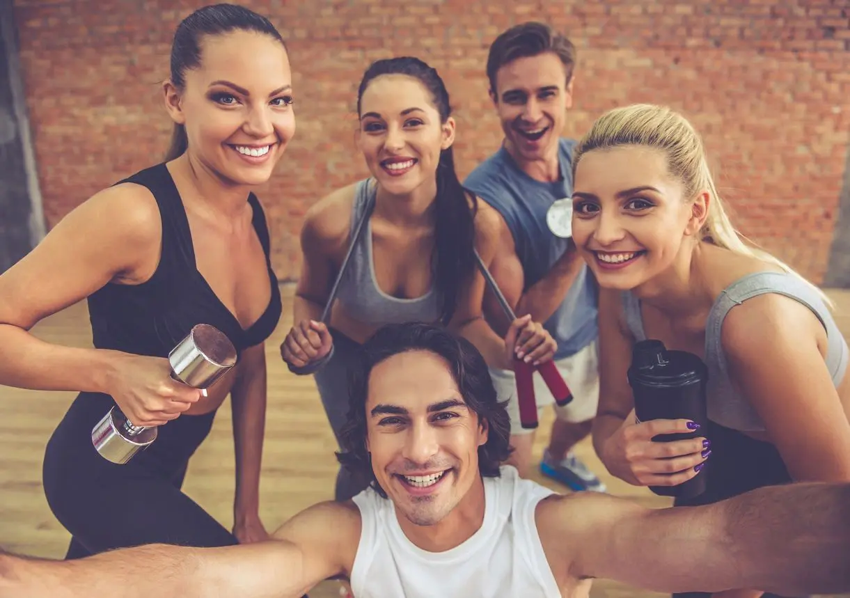 A group of people that are posing for the camera